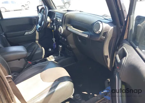 2015 Jeep Wrangler Unlimited Freedom Edition z USA, uszkodzony, nr VIN 1C4BJWDG8FL573414